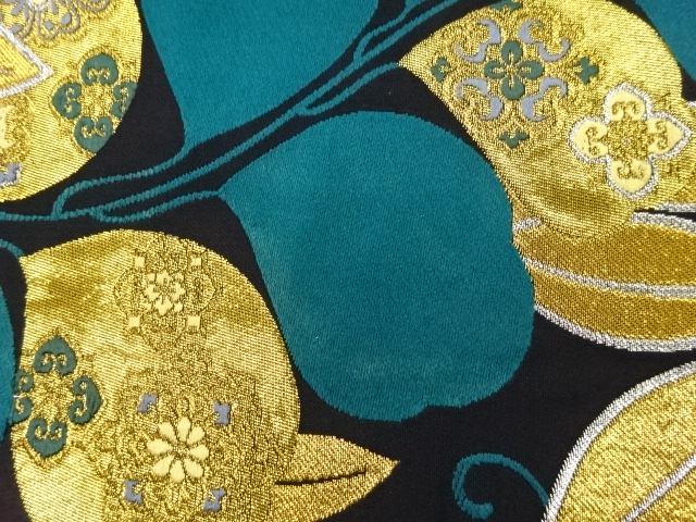  葉に華文模様織出し袋帯